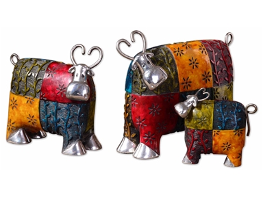 These colorful cows will definitely pop in a stark white background. Made with metal and green, blue, red, and orange finishes, these playful accessories are sure to get your guests' approval.