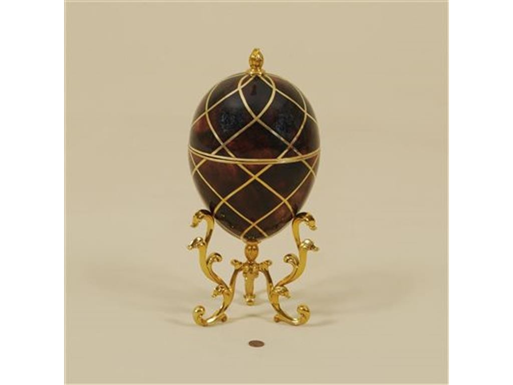 The Maitland-Smith Accessories Red Dyed Penshell Inlaid Egg Shaped Box 1100-566 isn’t just an Easter but an all-year-round decor.
