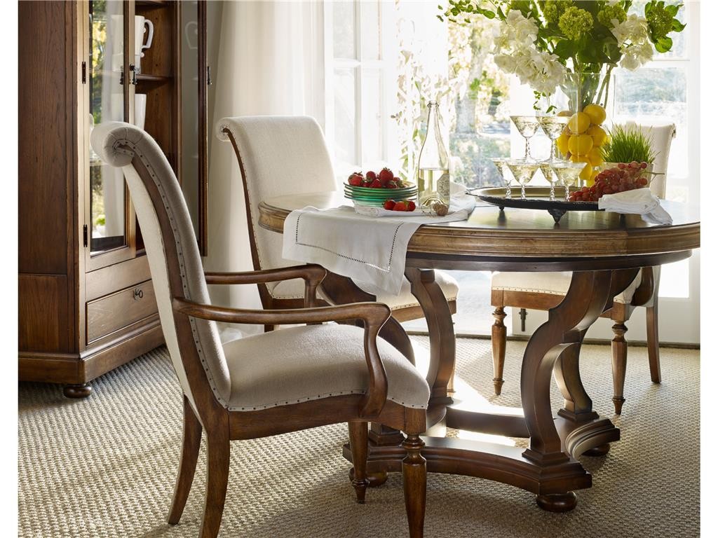 Punches of yellow, red and green can be seen in a neutral backdrop. Featured items are from Hooker Furniture’s Archivist Collection.