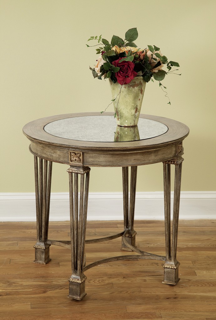 Floral arrangements create an interesting backdrop to an otherwise boring bedroom nook. Featured table is from FFDM’s Biltmore Collection. 