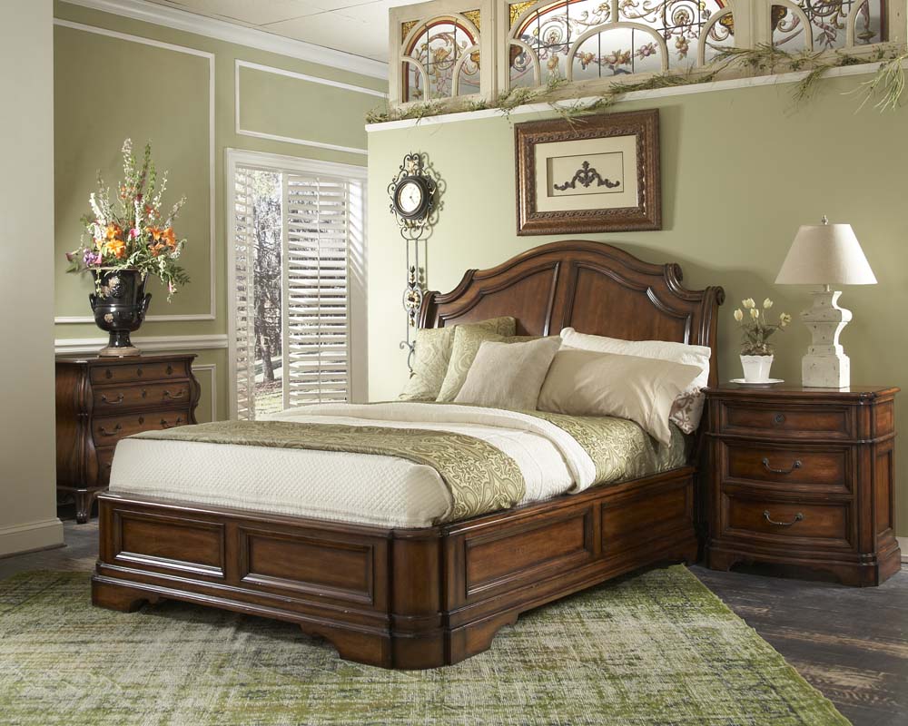 The potted flowering plant plus the curves on some of the accessories softened the linear look of the bed. Featured bedroom set is from FFDM's Vintage Classics.