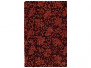 Capel Incorporated Floor Coverings Waller Oak Rug 9221RS05000800550 is traditionally-woven with stenciled leaf designs. This carpet shows how stenciling can be carried over to other interior design elements.