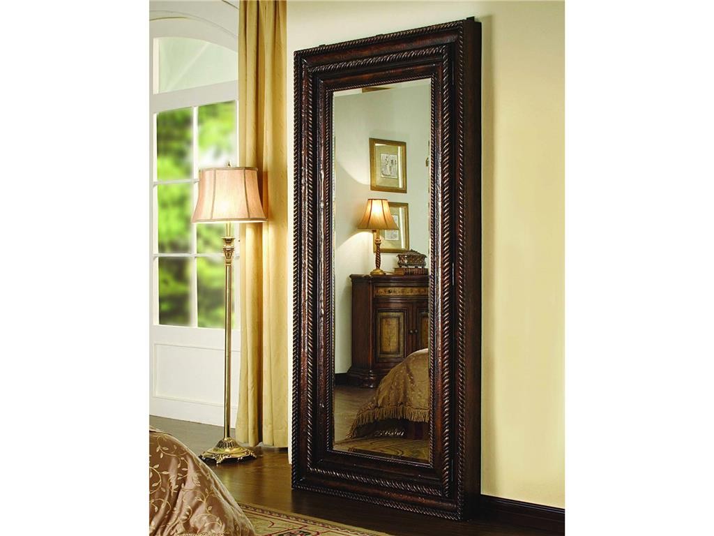 Hooker Furniture Accents Floor Mirror with Hidden Jewelry Storage effectively reflects daylight from the outdoors.