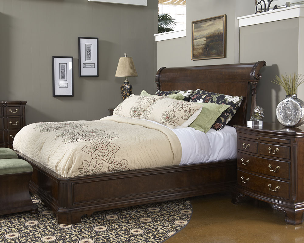Traditional and modern elements are creatively mixed in this bedroom. The wooden pieces take centerstage as the decorative elements effectively frame their beauty. Featured furniture is from FFDM's American Cherry Collection.