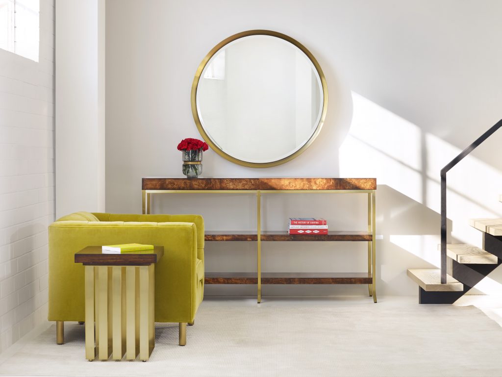 Cynthia Rowley’s 1586-80117A-BRN1 Horizon Line Square Accent Table balances every other element placed in this nook. It has effectively served as an anchor to the colorful couch, the modern mirror and the flight of stairs leading to an upstairs room somewhere.