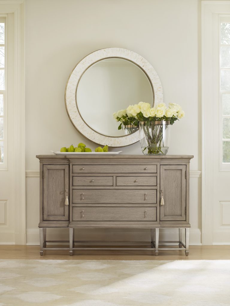 Cynthia Rowley’s 1586-75907-GRY1 Soiree Sideboard 1586-90007-MULTI Aura Round Shell Accent Mirror will make any hallway worth spending a time at.