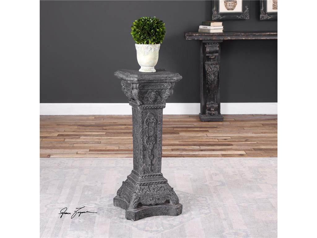 The Accessories Uttermost Maurizio Stone Plant Stand 24624 holds this potted green plant. Plants can also up the level of positive chi in your home. 