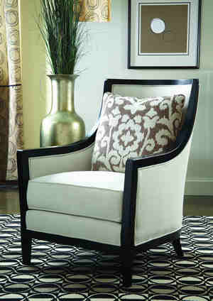 FFDM's Protege Collection: This geometric carpet pairs well with the hardwood flooring that it's on.