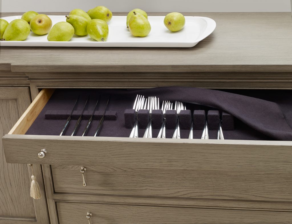 The rustic beauty of the 1586-75907-GRY1 Soiree Sideboard can perfectly house your fine silverware. Use fresh fruits as decorative enhancers.