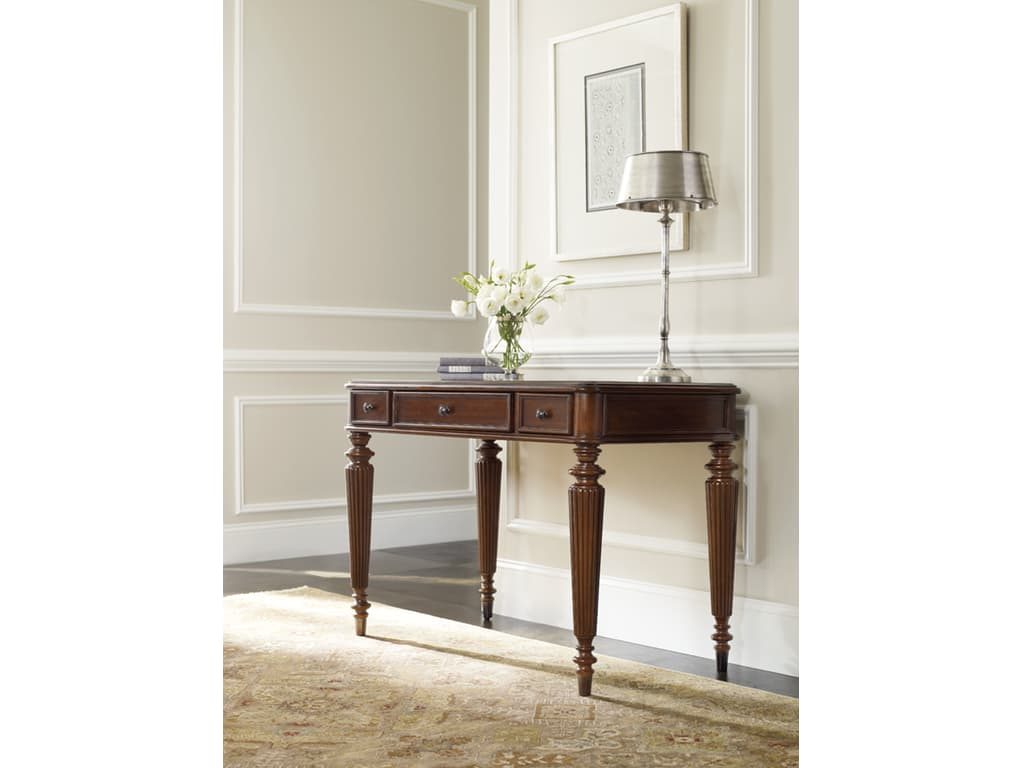 Hooker Furniture Home Office 42-in Leg Desk provides the perfect contrast to the whitewashed surroundings.