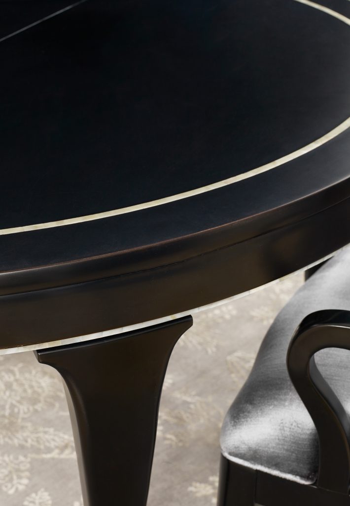 BLK1 Bloom Round Dining Table with 1-20in leaf offers a jet black earthiness that's difficult to ignore. 