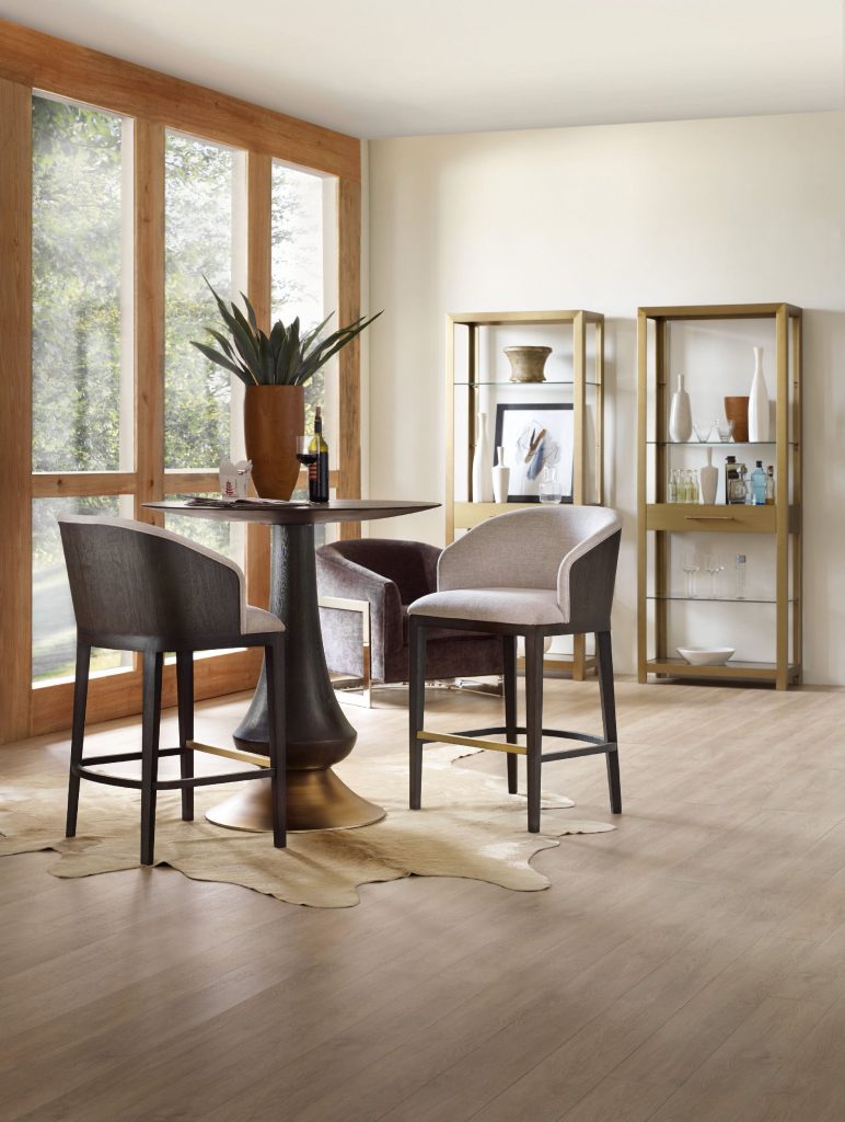 The Hooker Furniture Dining Room Curata Pub Table is beautifully highlighted by the neutral background.