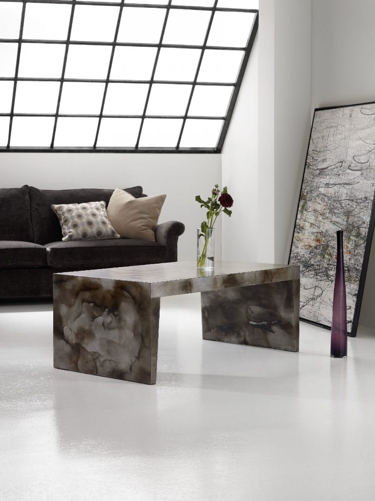 The smooth, sturdy surface of the Hooker Furniture Living Room Melange Lincoln Cocktail Table is the epitome of smooth surface that's perfect for modern homes.